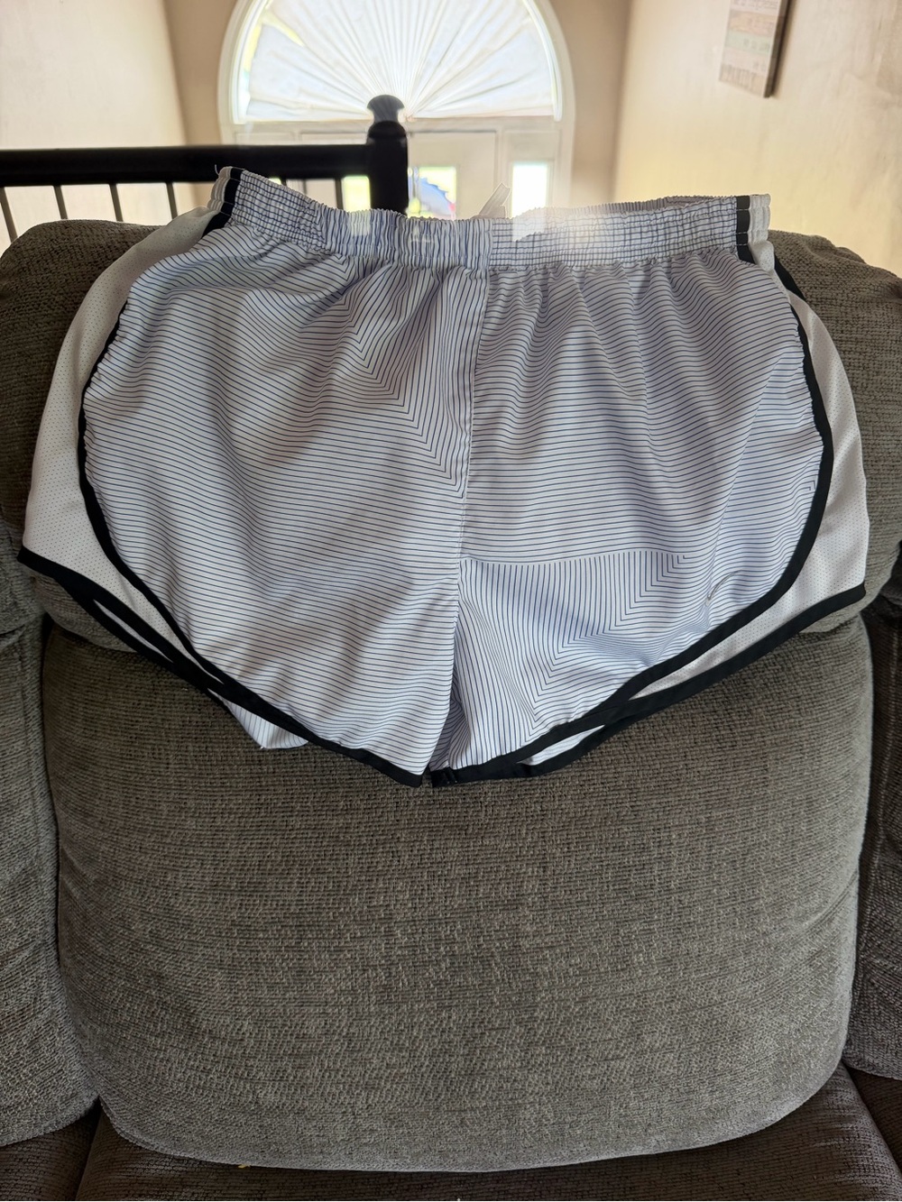 Woman’s White Striped Athletic Shorts with Black Trim